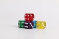 Colorful sparkling dices on the table Royalty Free Stock Photo