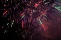 Colorful sparks in night sky background Royalty Free Stock Photo