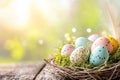 Colorful speckled easter eggs in decorative nest for spring celebration design Royalty Free Stock Photo