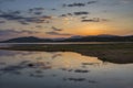 Colorful, spectacular sunset over Balkan mountain and artificial lake Jrebchevo. Last rays of light. Royalty Free Stock Photo