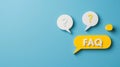 Colorful speech bubbles with question marks and the word FAQ on a blue background. Ideal for customer service or information Royalty Free Stock Photo
