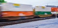 Colorful Speeding Double-stack Freight Train