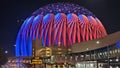 The colorful Sphere at The Venetian Resort surrounded by buildings at night in Las Vegas Nevada