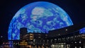 The colorful Sphere at The Venetian Resort surrounded by buildings at night in Las Vegas Nevada