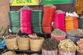 Colorful Spice Baskets in a Local Marketplace