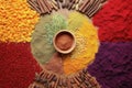colorful spices arranged in a circular pattern