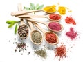 Colorful spices in the wooden spoons on the white Royalty Free Stock Photo