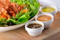 Colorful spicy sauces and bacon salad Royalty Free Stock Photo