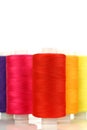 Colorful spindles of yarn Royalty Free Stock Photo