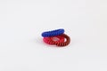 Colorful spiral hair scrunchy on white background Royalty Free Stock Photo