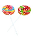 Colorful spiral lollipop candy on stick, isolated on white background. (clipping path) Royalty Free Stock Photo