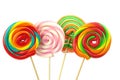 Colorful spiral lollipops on white background