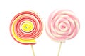 Colorful spiral lollipops on white background