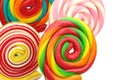 Colorful spiral lollipops on white background, close up. Royalty Free Stock Photo