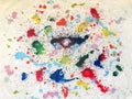 Colorful splattered paint on white background. Abstract art backdrop light blue, green and red colors