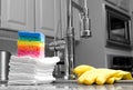 Colorful sponges and gloves in kitchen Royalty Free Stock Photo