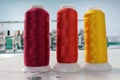 Colorful spools embroidery thread production Royalty Free Stock Photo