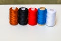 Colorful spools of sewing thread isolated on white background Royalty Free Stock Photo