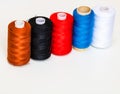 colorful spools of sewing thread isolated on white background Royalty Free Stock Photo