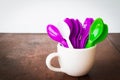 Colorful spoons and glass Royalty Free Stock Photo