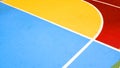 Colorful sports court background. Colorful field rubber ground with white lines outdoors.