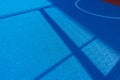Colorful sports court background. Top view light blue field rubber ground with white line outdoors Royalty Free Stock Photo