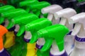 Colorful spray bottles with cleaning agents