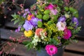 Colorful spring bouquet from fresh cut flowers - freesia, chrysanthemums, persian buttercups, sea lavender - flowers Royalty Free Stock Photo