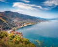 Colorful spring cityscape of Pogradec town. Sunny morning scene of Ohrid lake. Royalty Free Stock Photo