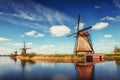 Colorful spring day with traditional Dutch windmills canal in Ro