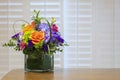 Colorful Spring Flowers in Square Vase on Kitchen Counter Royalty Free Stock Photo