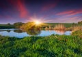 Colorful spring landscape on fishing pond. Royalty Free Stock Photo