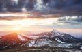 Colorful spring sunset over the mountain ranges in the national Royalty Free Stock Photo