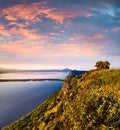 Colorful spring view of the Voidokilia beach from Navarino Castle. Great sunrise on the Ionian Sea, Pylos town location,