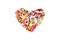 Colorful sprinkles sugar decoration for topping cake and bakery as heart concept isolated on white Royalty Free Stock Photo