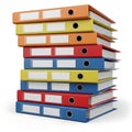 A colorful stack of binders with various labels and dividers Royalty Free Stock Photo