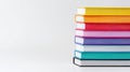Colorful Stack of Books with Bright Spines on Minimalist White Background for Education Learning and Library Design Projects Royalty Free Stock Photo