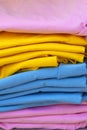 Colorful Stack of T Shirt and Polo. Stack of clothes. Royalty Free Stock Photo