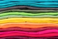 Colorful stack of t-shirts clothes texture background Royalty Free Stock Photo