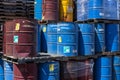 Colorful stacked steel barrels