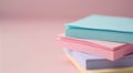 Colorful Stacks of Paper Sheets on Soft Pink Background in Bright Lighting Royalty Free Stock Photo