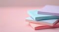Colorful Stacks of Paper Sheets on Soft Pink Background in Bright Lighting Royalty Free Stock Photo
