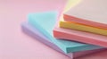 Colorful Stacks of Paper Sheets on Soft Pink Background in Bright Lighting Royalty Free Stock Photo