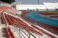 Colorful of stadium seats in background. Royalty Free Stock Photo