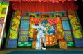 Colorful stage of chinese theater and one actor playing a role in a traditional dramatic play