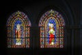 Colorful stained glass with illustrations of religious figures