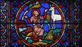 Colorful stained glass window in Cathedral Notre Dame de Paris Royalty Free Stock Photo