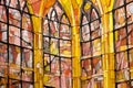 Colorful stained glass window in a church, closeup of photo Royalty Free Stock Photo