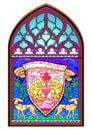 Colorful stained glass window. Gothic architectural style. Beautiful ornament with Celtic family royal coat of arms symbol. Royalty Free Stock Photo