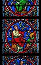 Colorful stained glass window in the Notre Dame Cathedral in Paris Royalty Free Stock Photo